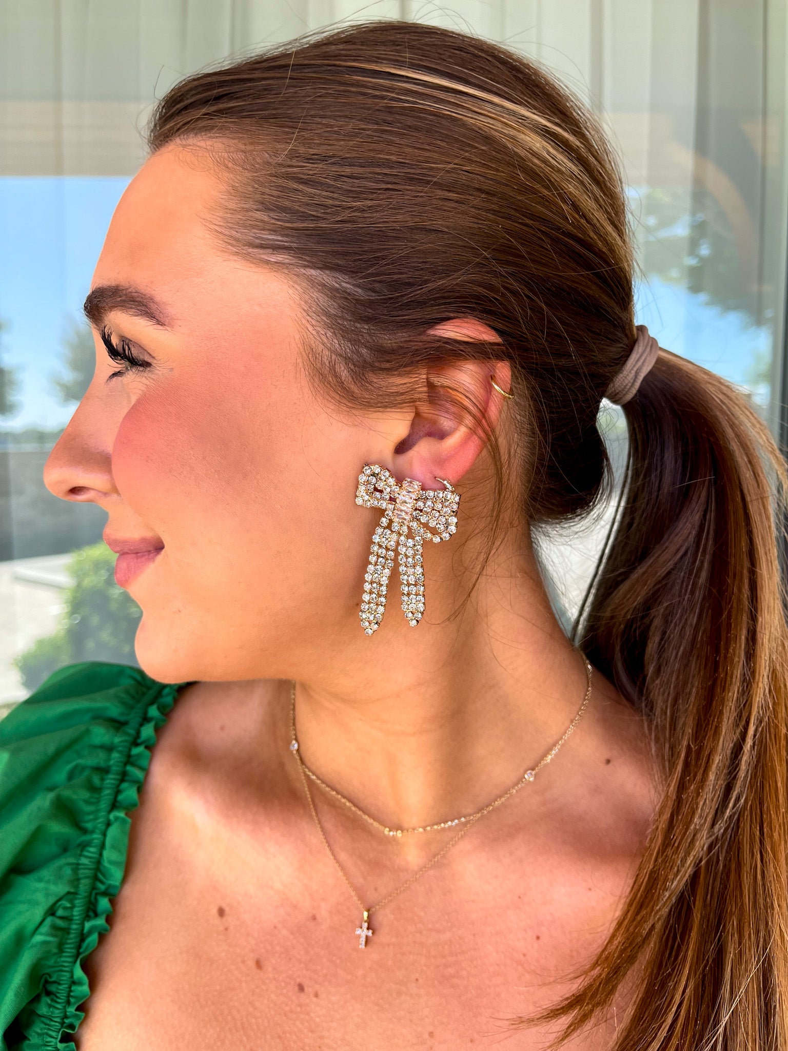Woman with sparkling earrings